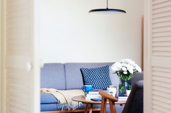How to decorate with a low pendant light in a living room